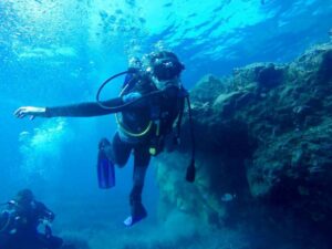 Diver with hogarthian diving gear